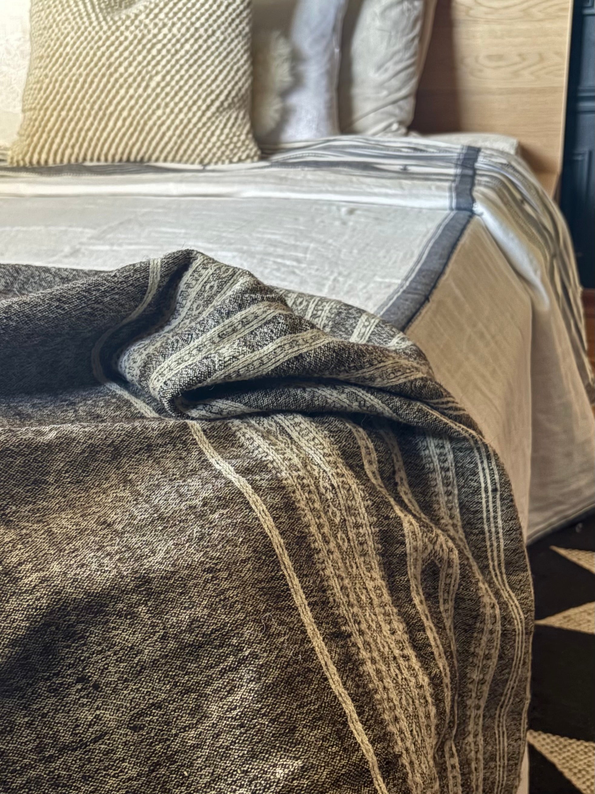 The Pastoralist Wool Throw in Warm Ash