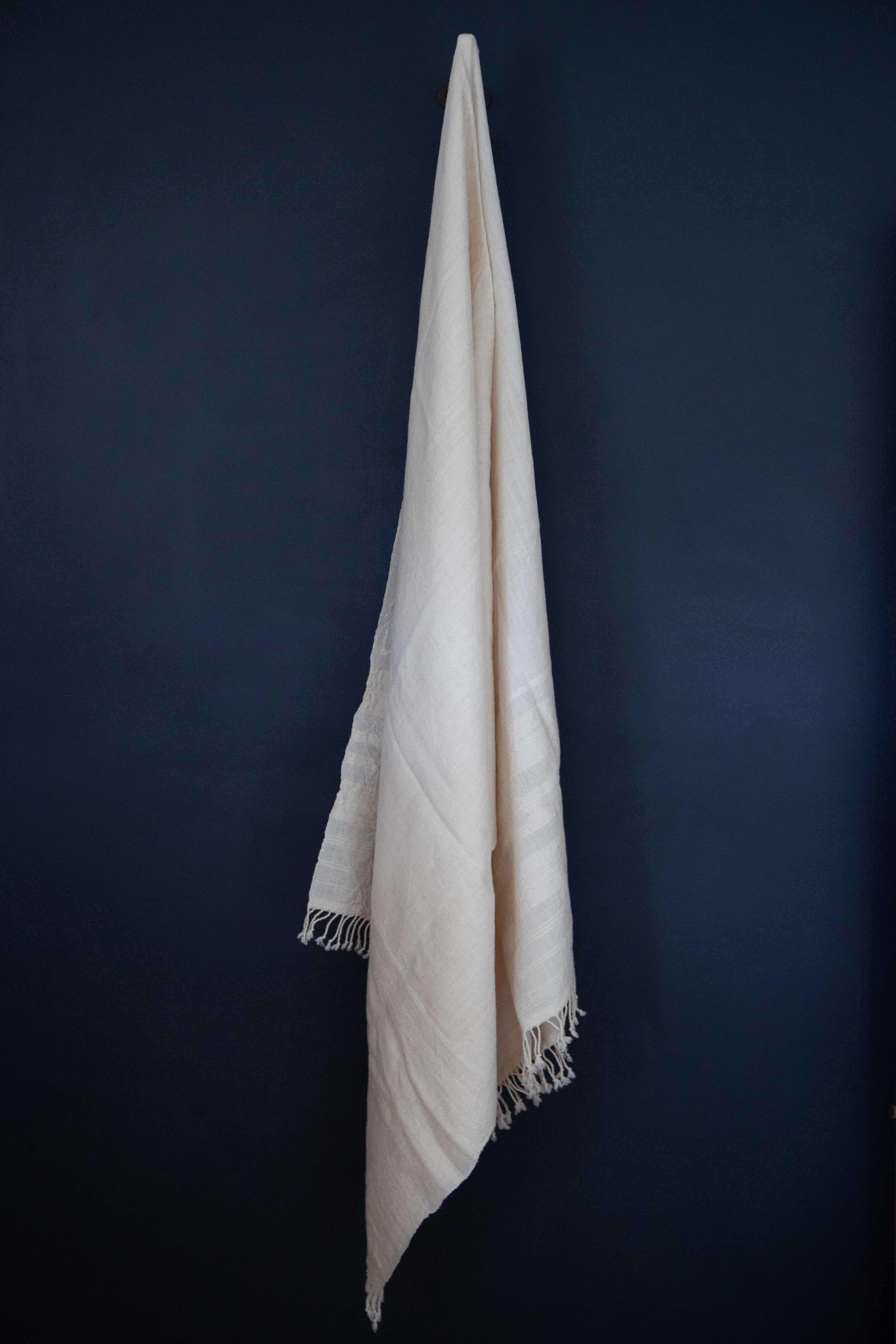 The Pastoralist Wool Throw in Ivory